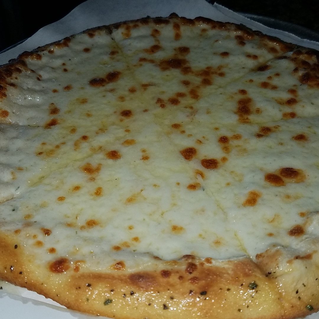 A cheesy, golden-baked pizza with a thick crust.